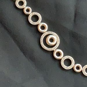 Silver Circles Bracelet with small crystals or rhinestones.